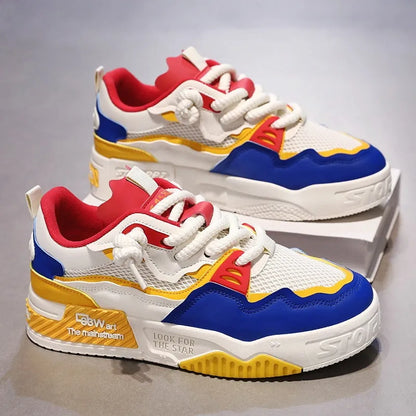 Men's low-top board shoes with rubber soles in white and yellow colour combination