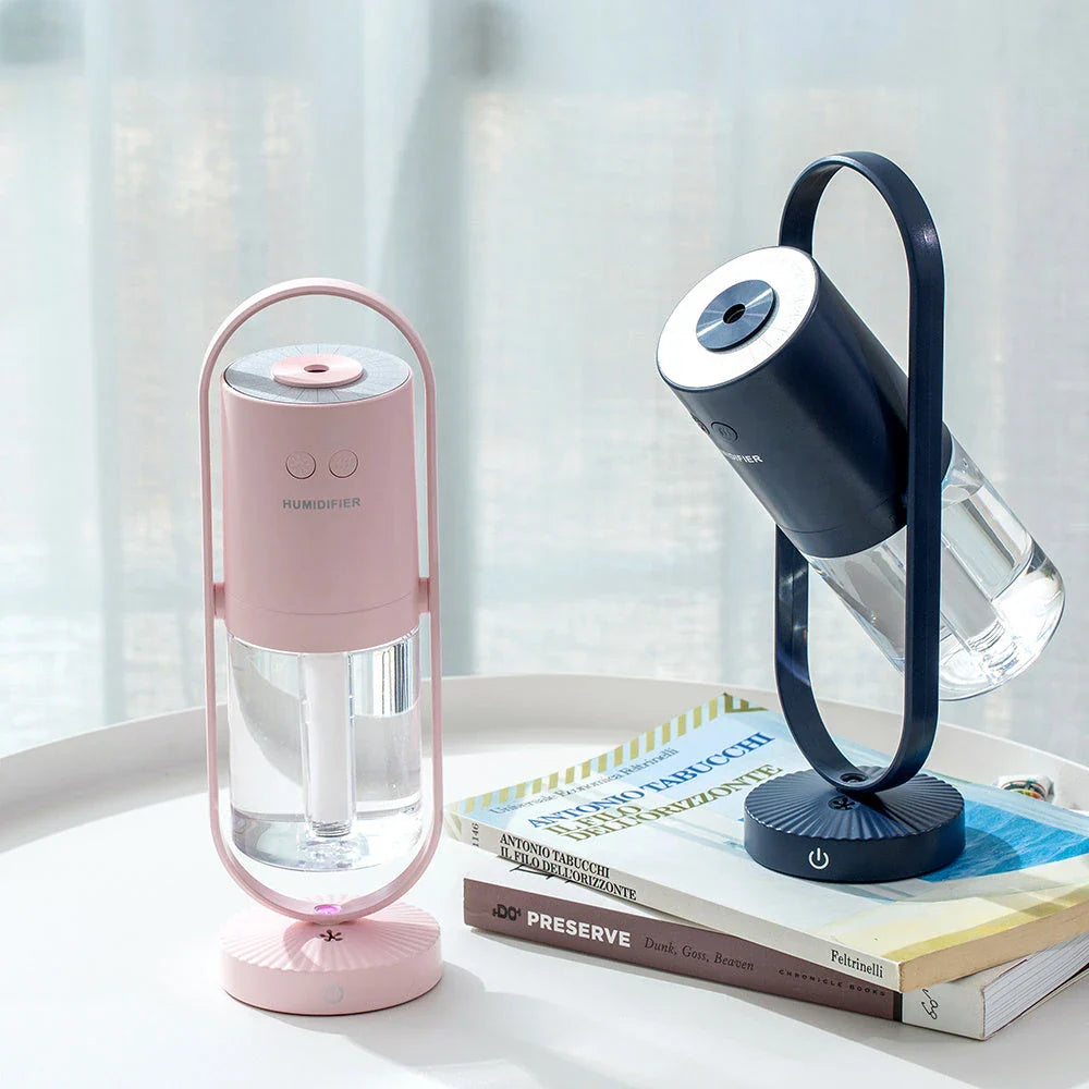 Compact desktop humidifier with starry projection feature, designed to improve air moisture and create a relaxing ambiance.