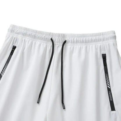 Men's black quick-dry nylon sports shorts with a loose fit and elasticated waistband.