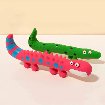 Green lizard-shaped dog chew toy with textured surface and squeaker, measuring 24cm long