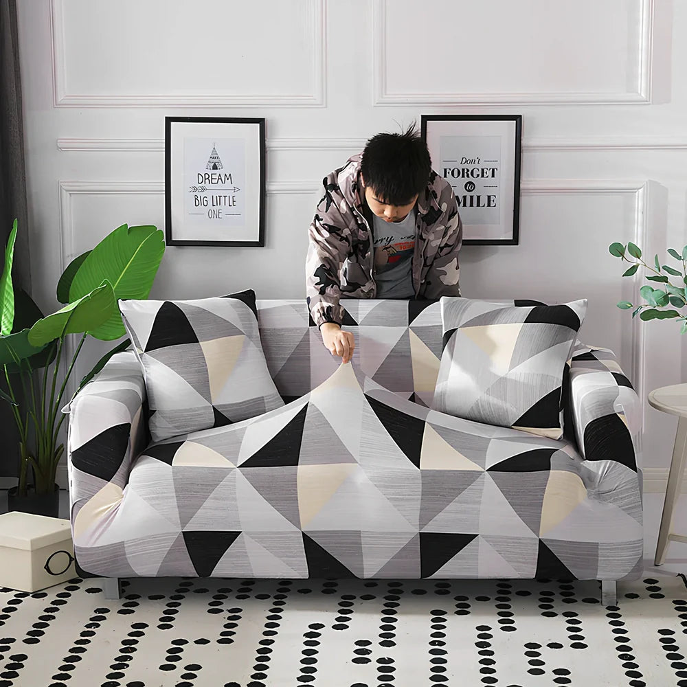 Printed geometric pattern sofa cover on double seat sofa measuring 145-185cm with spill protection