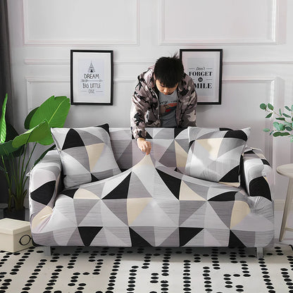 Printed geometric pattern sofa cover on double seat sofa measuring 145-185cm with spill protection
