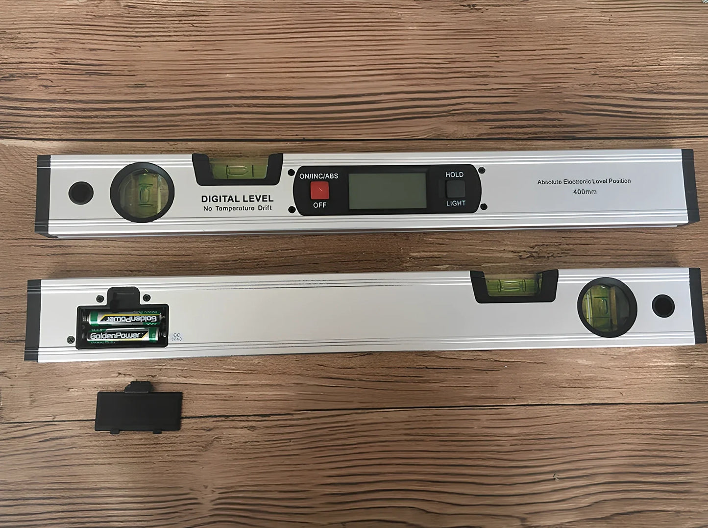 Magnetic digital angle meter with LCD display showing degree measurement on metal surface