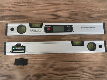 Magnetic digital angle meter with LCD display showing degree measurement on metal surface