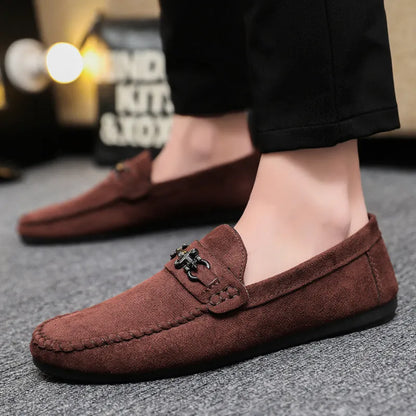 Men's black waterproof slip-on loafers with round toe and low stiletto heel on a rubber sole