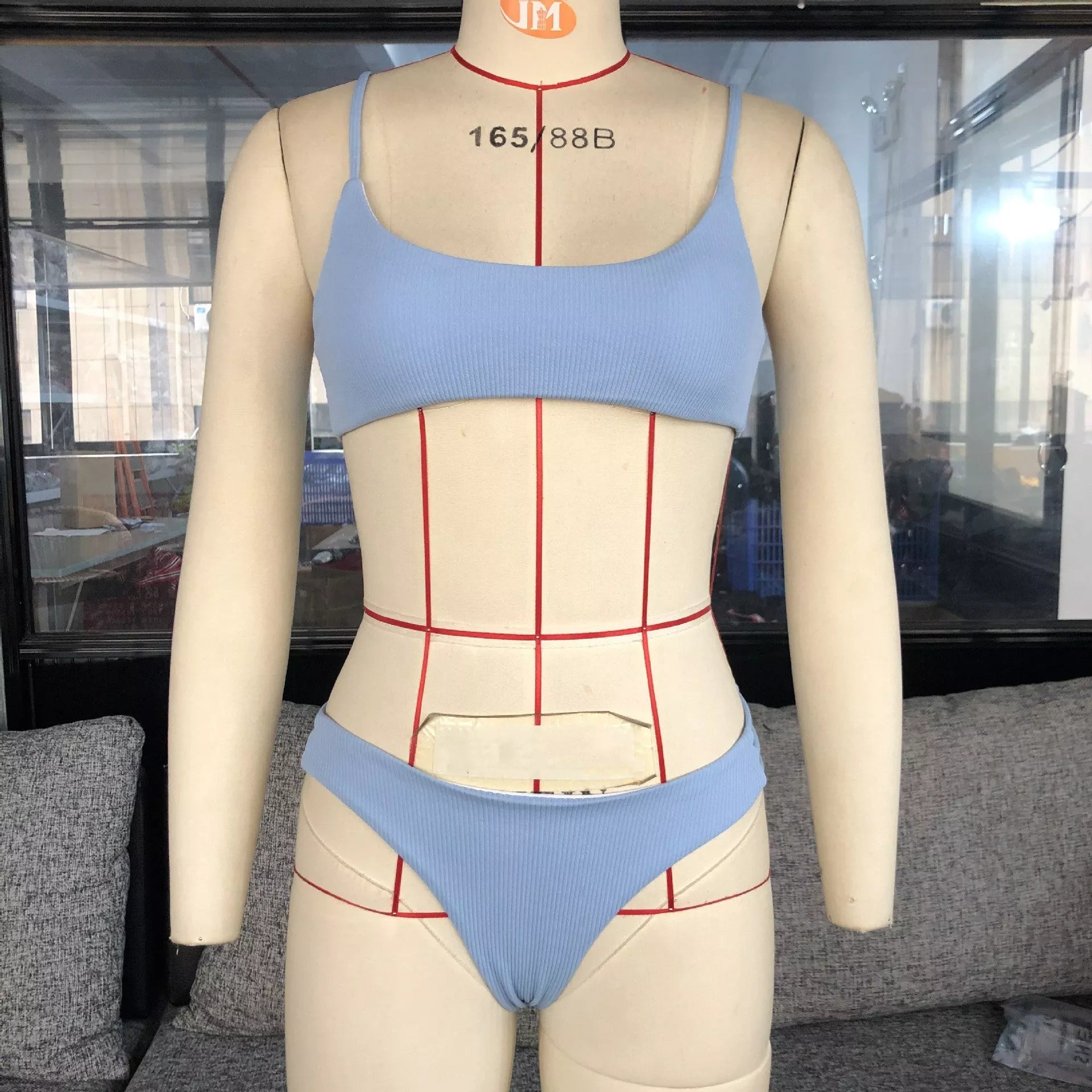 Solid color striped bikini with blue stripes, made of 80% nylon and spandex lining