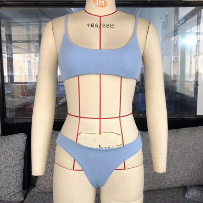 Solid color striped bikini with blue stripes, made of 80% nylon and spandex lining