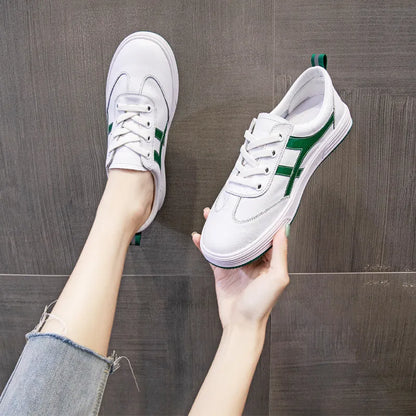 Korean style casual sneakers with elastic bands, cowhide upper and round toe in white or black