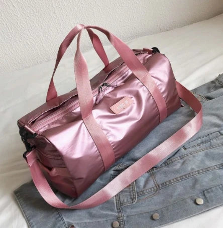 Premium durable fitness gym bag with separate compartments for shoes, laundry, and other gear, made of water-resistant materials for versatile use