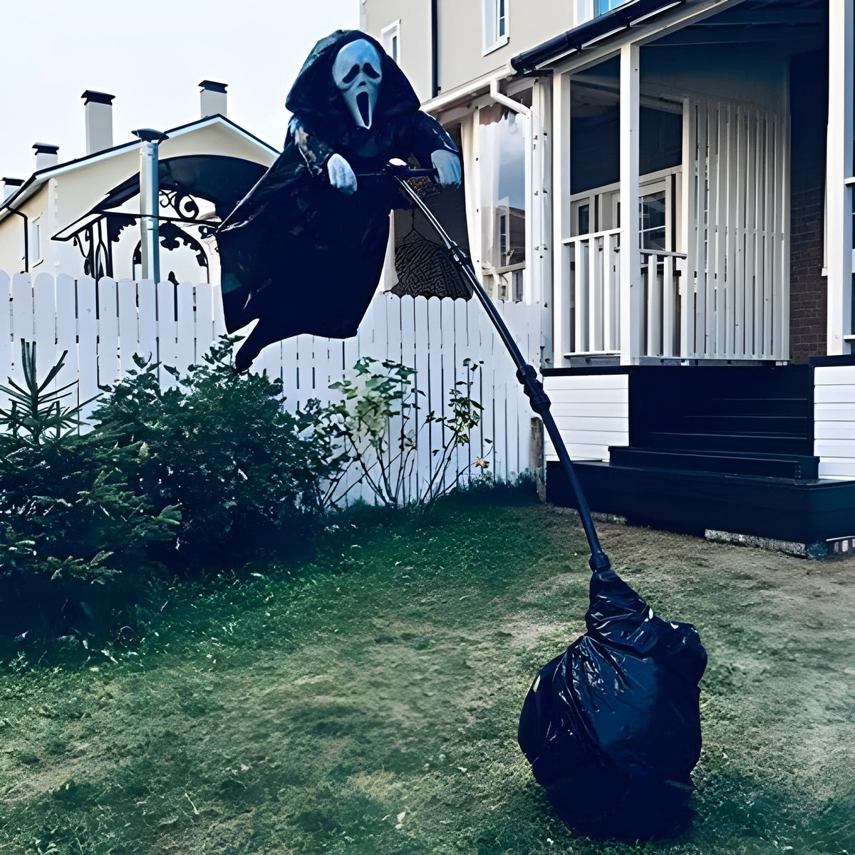 Plastic skeleton scarecrow with screaming skull design measuring 70cm tall for Halloween gardens