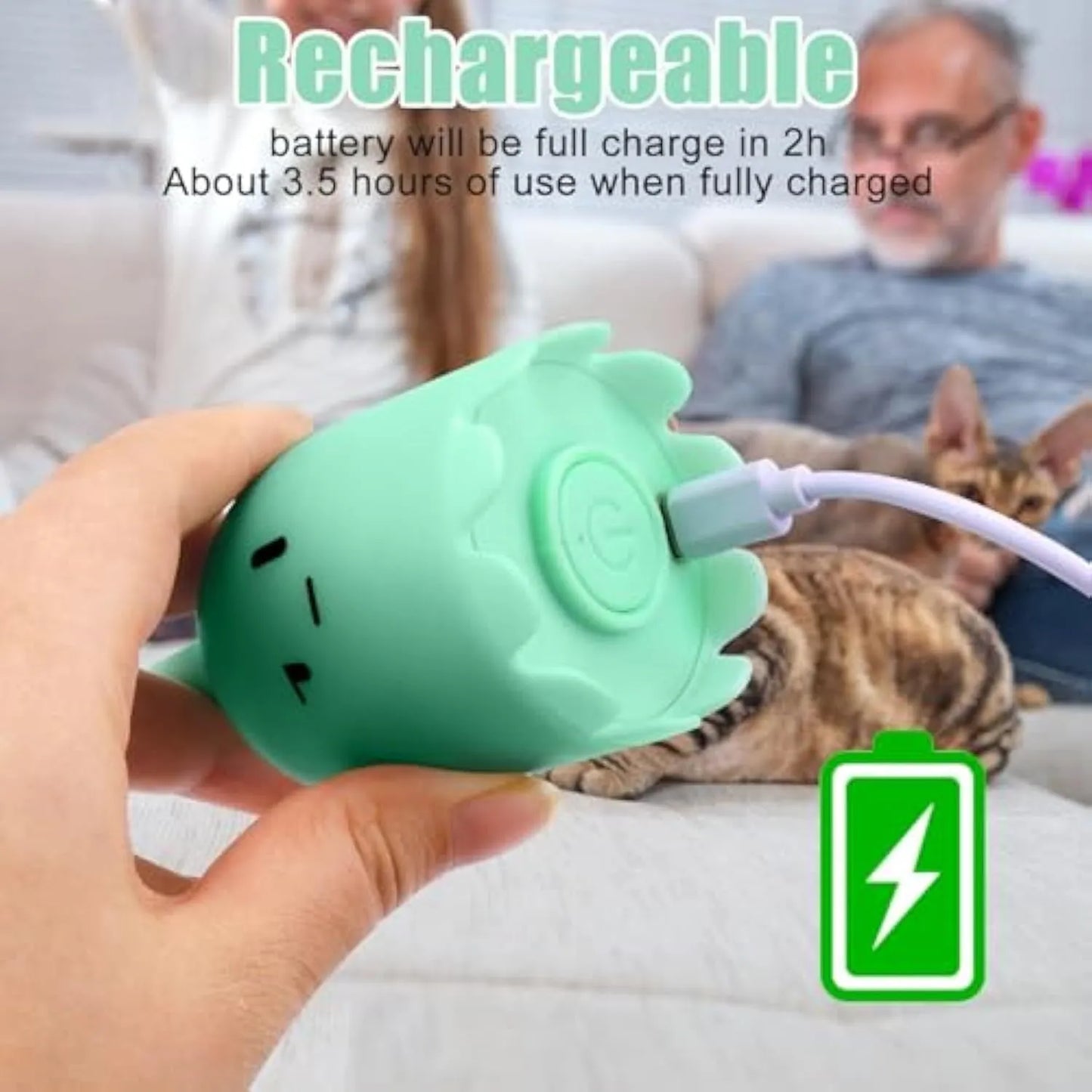 Green automatic electronic cat wand toy with silicone tails moving, placed on a carpet.