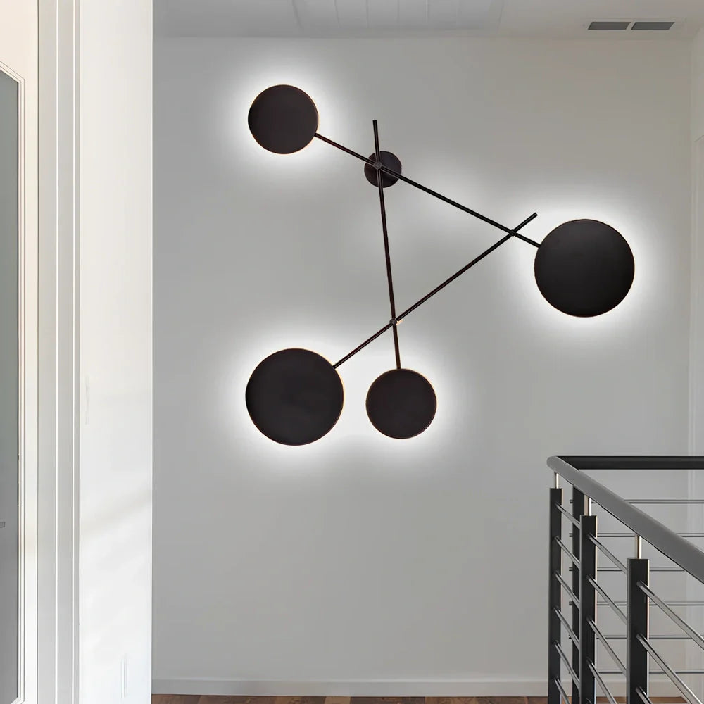 Triangular iron LED wall lamp with black finish and modern geometric design for home lighting