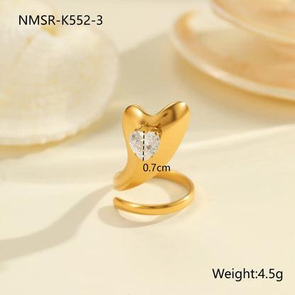 Geometric zircon ring showing round, oval and quadrangular design elements in stainless steel with electroplated finish