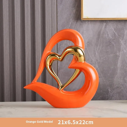Modern geometric heart ornament in white porcelain with metallic colour finish options