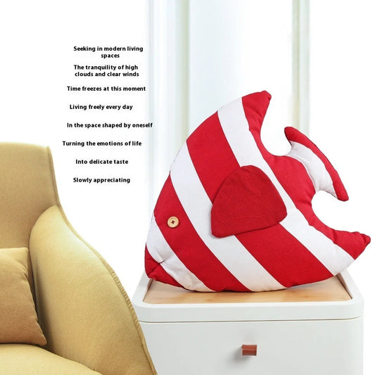 Mediterranean-style cushion with woven red and blue stripes measuring 44x40x10cm with tassel detailing