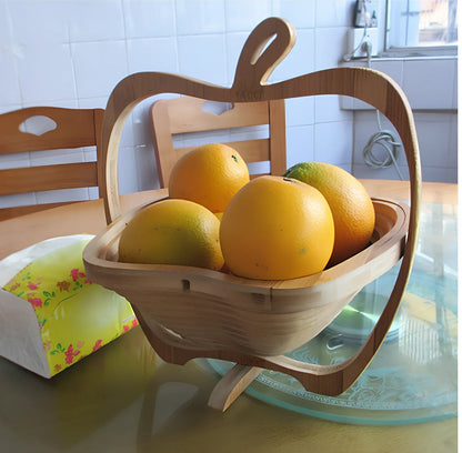 Folding natural bamboo fruit basket open at 27 cm wide, 30 cm high, collapsed to 1.8 cm for storage