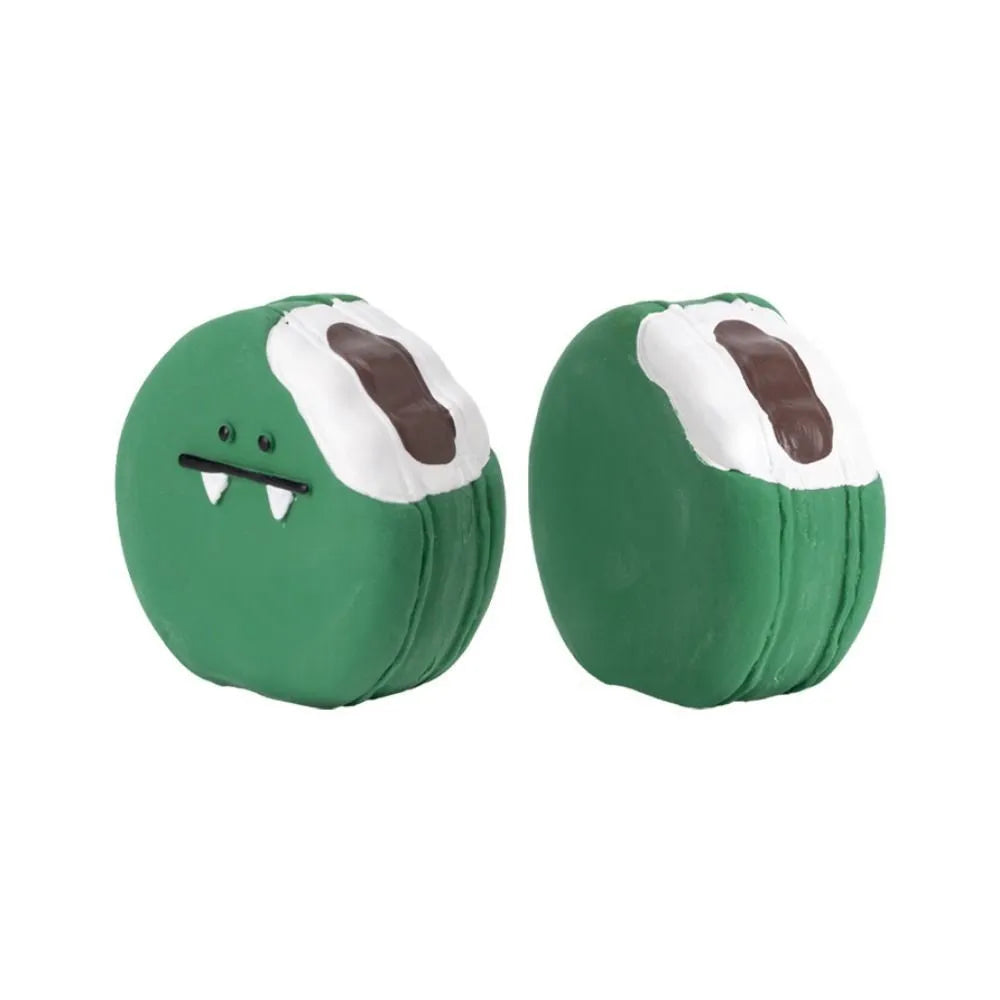 Green and yellow cartoon egg bread shaped latex dog chew toy with squeaker.