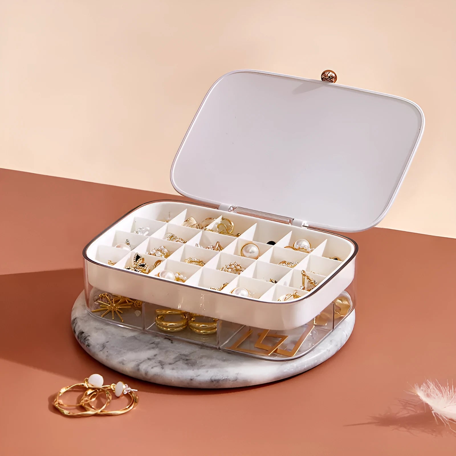 Green multi-layer jewelry storage box with organised compartments for earrings and rings