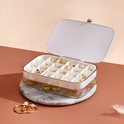 Green multi-layer jewelry storage box with organised compartments for earrings and rings