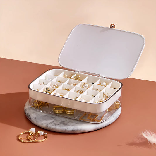 Green multi-layer jewelry storage box with organised compartments for earrings and rings