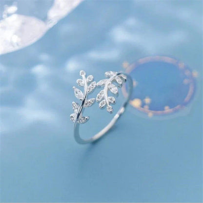 Women's fashion branch ring with leaf design in silver and gold finishes