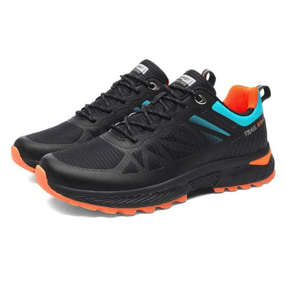 Men's black outdoor running shoes with mesh upper, PHYLON midsole, and rubber MD TPU sole showing round toe shape and lace-up front