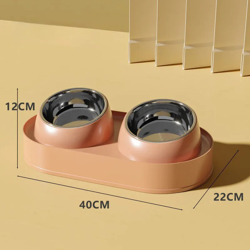 White elevated pet double bowl feeder with tilted food and water bowls on a non-slip stand.