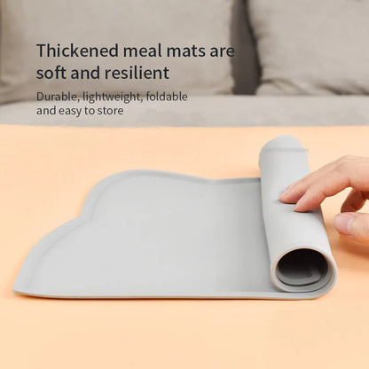 Blue silicone pet feeding mat in cat head shape for dog and cat food bowls