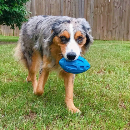 Natural rubber squeaky dog chew ball with surface grooves for medium and large breed dogs