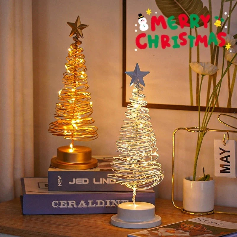Lighted metal Christmas tree with warm white LED lights, creating a cozy holiday decor for homes and offices.