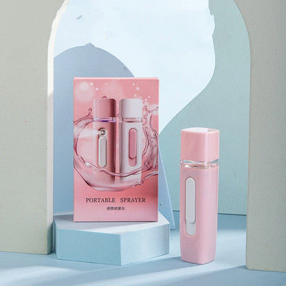 Portable facial mister with rechargeable power bank, transforms water into fine mist for skin hydration and rejuvenation