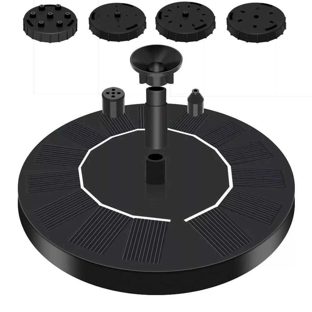 Solar-powered fountain with LED lights illuminating water stream in garden setting