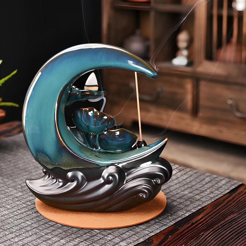Monochrome glazed porcelain backflow incense burner with smoke waterfall effect and abstract Chinese design