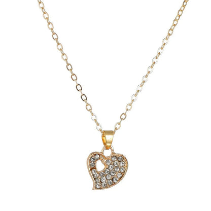 Gold-coloured women's love jewellery set with earrings, pendant and bracelet featuring bell patterns