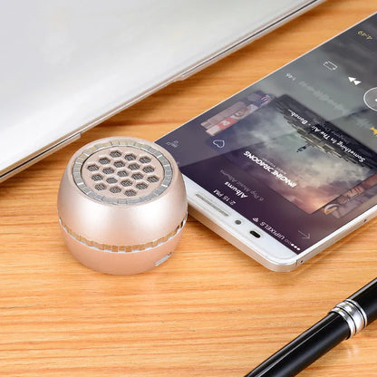 Universal external amplifier speaker in black, rose gold, and local gold colours with 5V power input.