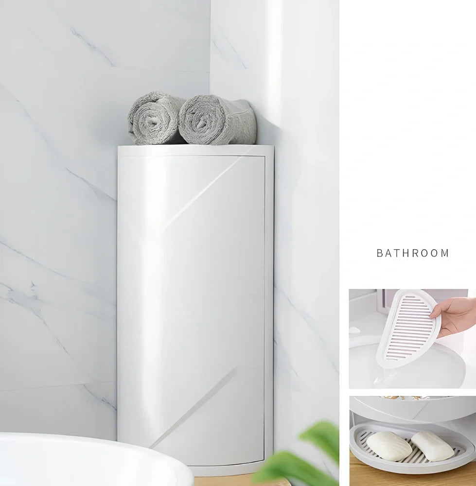 White triangle corner shelf with three tiers mounted in bathroom corner holding toiletries