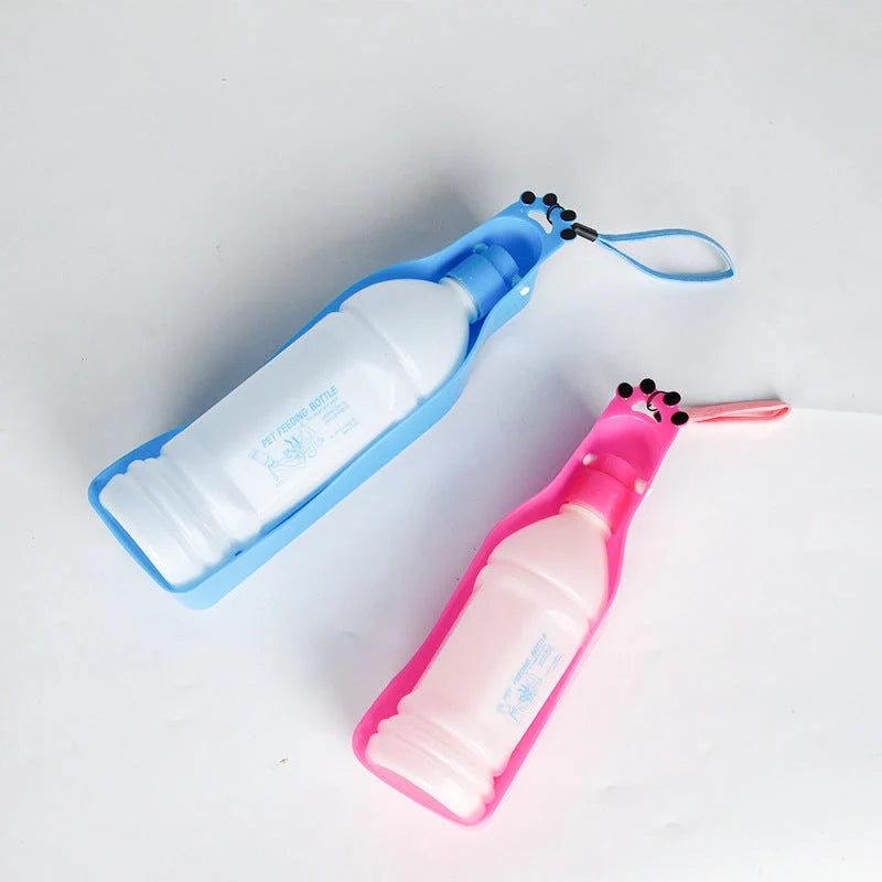 Portable Pet Cup Drinker in pink with 600ML capacity, featuring one-hand operation for easy use.