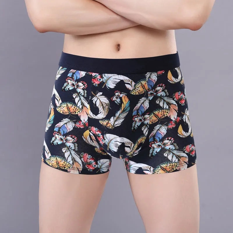 Men's cotton boxer briefs on a size chart showing weights for 3XL to 10XL, in floral colour options.