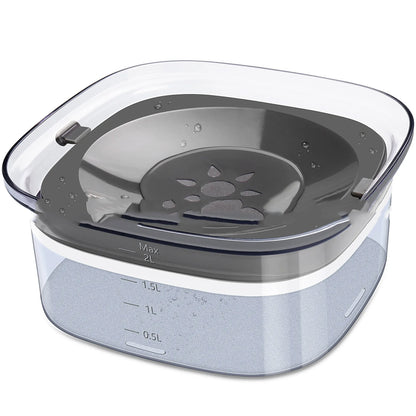 Transparent 2L dog water bowl with floating slow-feeding disk and non-slip base
