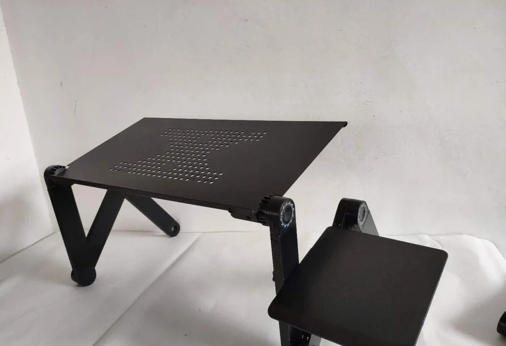Black aluminium folding computer desk with adjustable legs and non-slip baffles for laptop stability