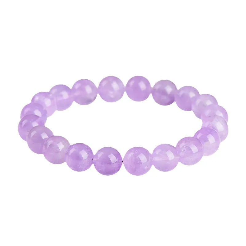 Lavender amethyst bracelet with water ripple geometric beads in various sizes on wrist