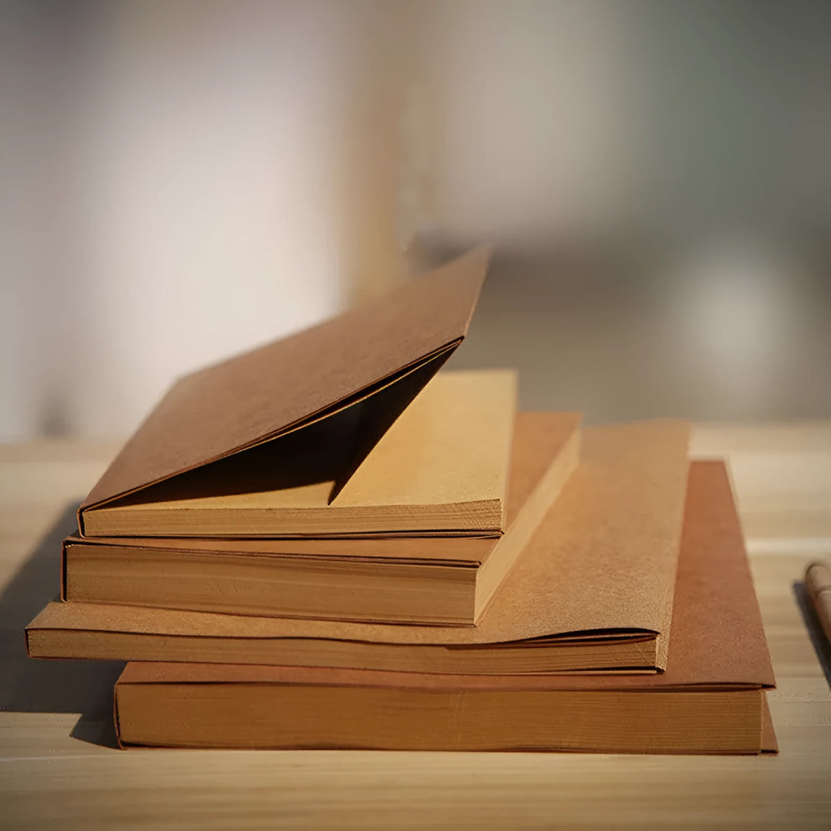 Brown kraft paper sketchbook open flat showing 132 pages, with 32K and 16K size options displayed.