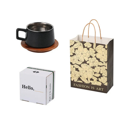 Office gift set showing stainless steel travel tumbler inside a gold-plated presentation box with optional gift bag.
