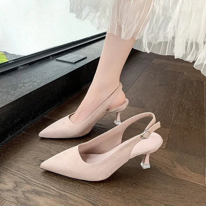 Apricot suede women's pointed-toe stiletto high heels on a plain background.