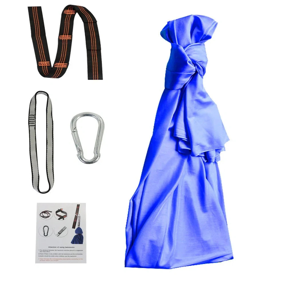 Child in black therapy swing cocoon with multi-loop daisy chain height adjustment system