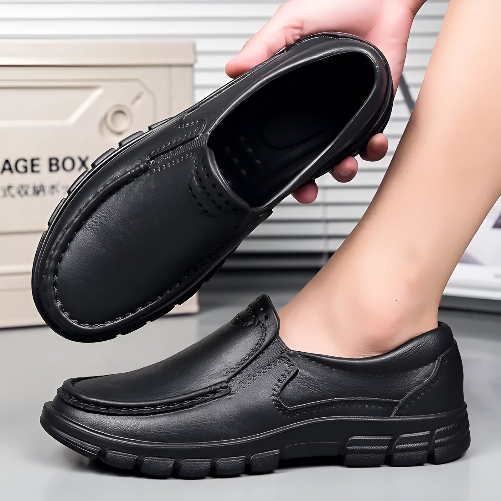 Men's black and brown slip-on work shoes with a mid-top, platform heel, and round toe.