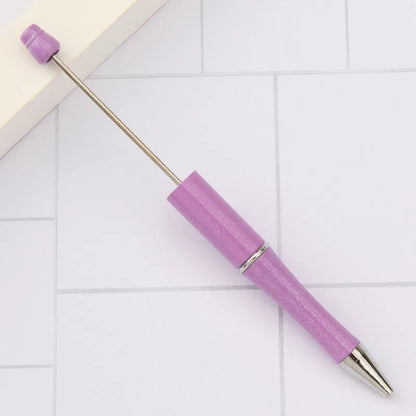 Rotating bead ballpoint pen in gradient colour with ABS plastic and steel wire construction