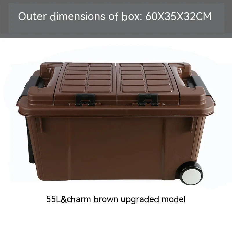 Large orange plastic storage box with black wheels and a pull-up handle, shown in a garage setting.