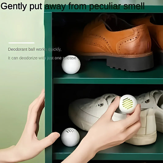 White shoe deodorant balls with green tea scent for 30-day odour elimination in footwear