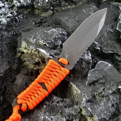 Outdoor survival knife with straight blade, rope-bound handle, and black ABS sheath on grey background